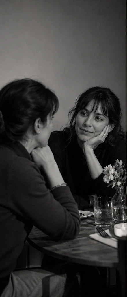Two women in conversation at a café